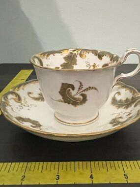 Elegant White and Gold Porcelain Teacup and Saucer from Wales England